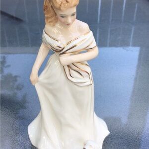 Elegant Royal Doulton Figurine in ivory and Gold